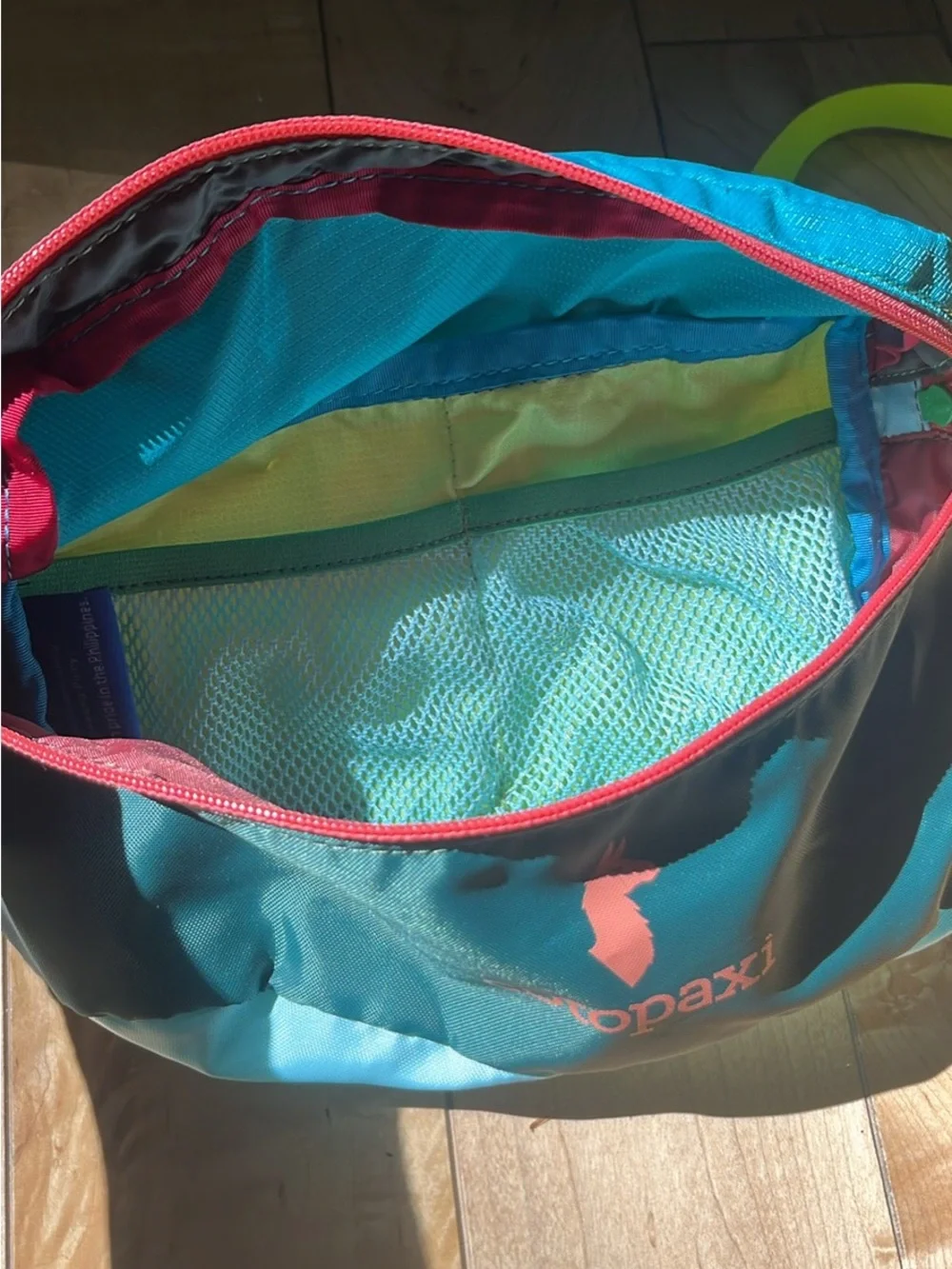 cotopaxi turquoise crossbody waist pack with pink zipper and lime strap - Picture 2 of 4